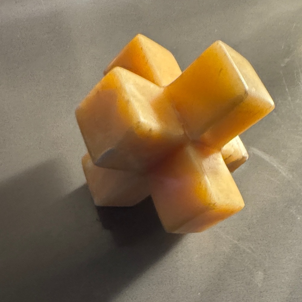 Polished Amber Stone Puzzle Sculpture